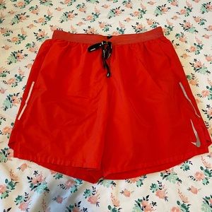 mens orange nike shorts size medium